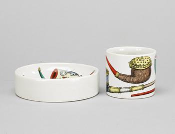 A Fornasetti ash tray and cigarett stand.
