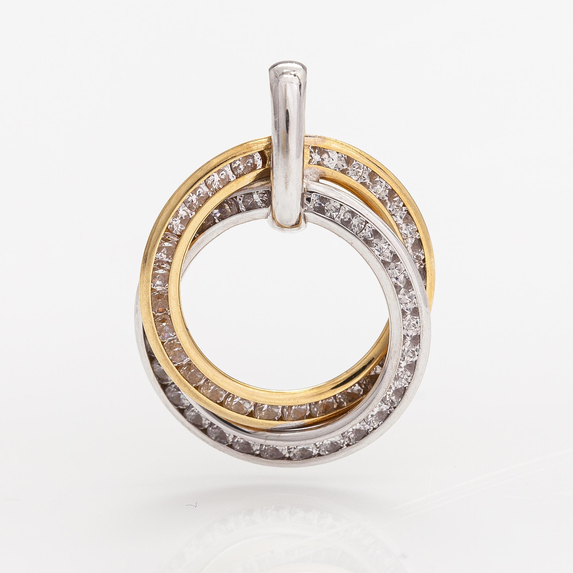 An 18K gold pendant with diamonds ca. 0.50 ct in total.