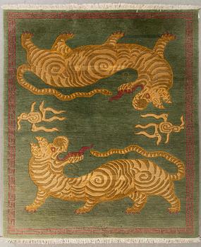 A tibetan rug. 240x170 cm.