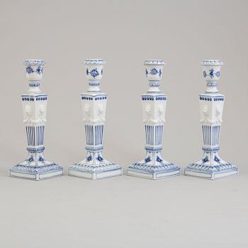 Two pairs of porcelain candlesticks by Royal Copenhagen, Denmark, third quarter of the 20th century.