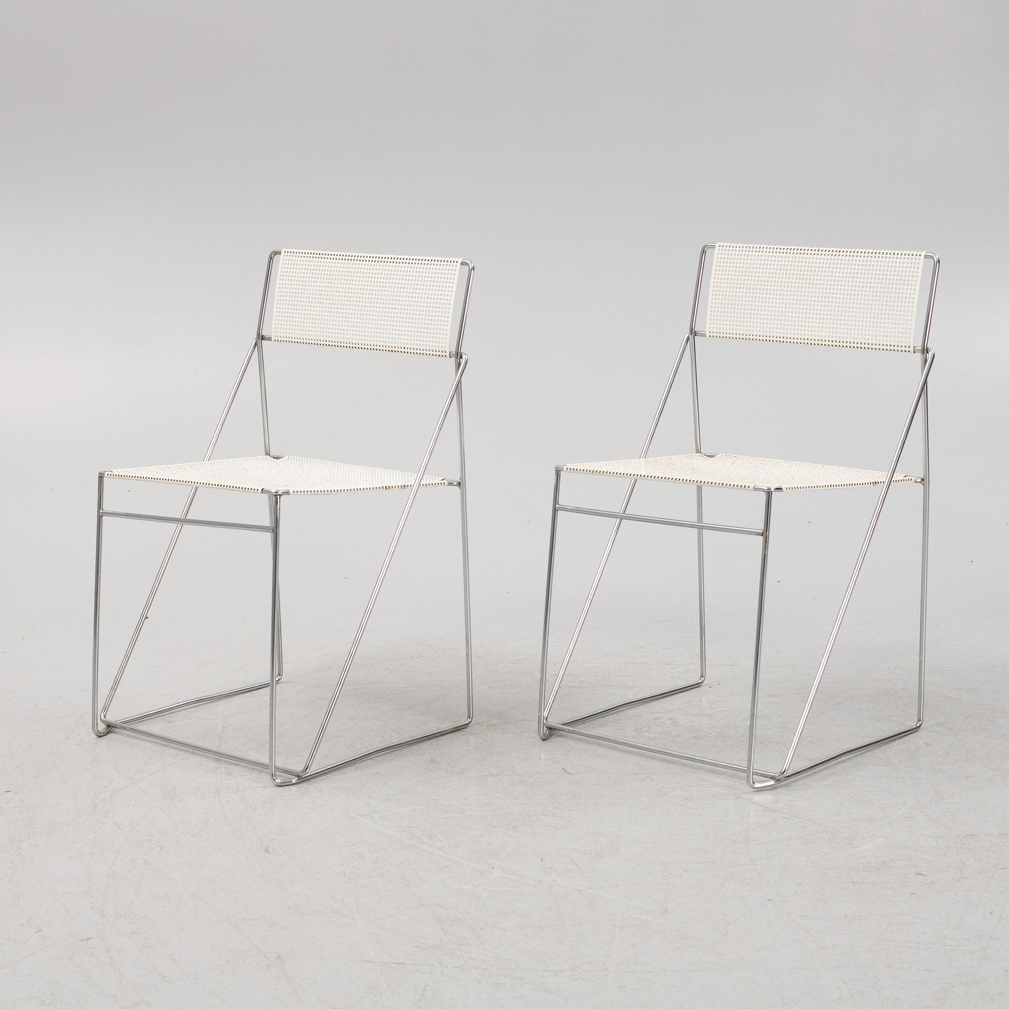 Nils Jörgen Haugesen, a pair of 'X-Line' chairs, Hybodan, Denmark, the model designed in 1977.