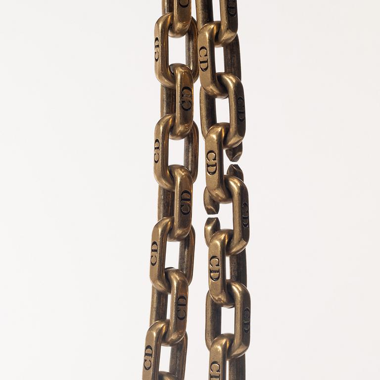 Christian Dior, A black leather "Dio(r)evolution" bag.