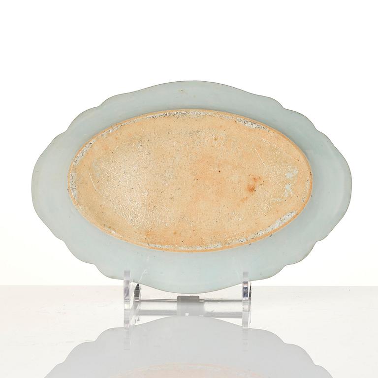 A group of famille rose 'double peacock' serving dishes, Qing dynasty, Qianlong (1736-95). (8 pieces).