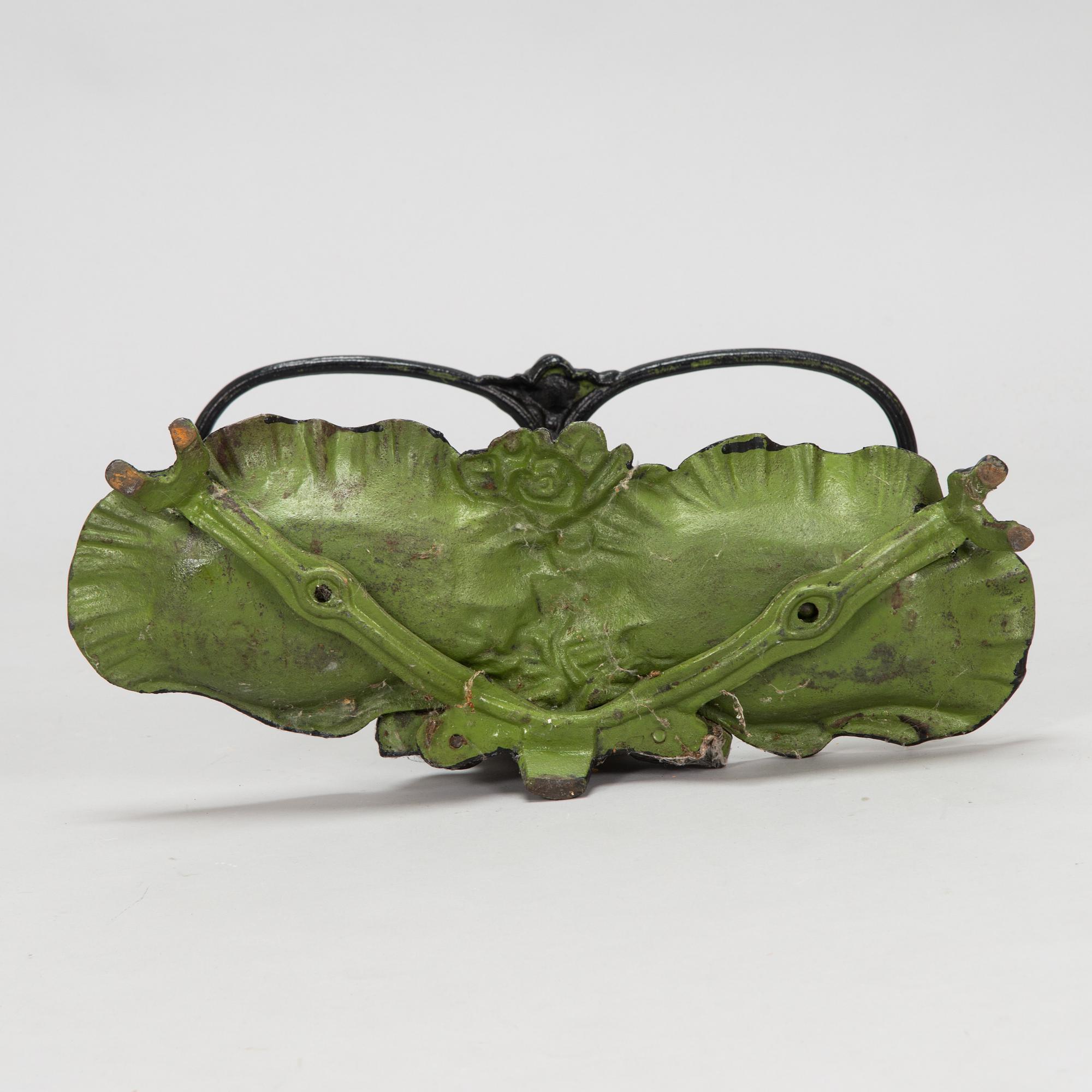A cast iron umbrella stand, 20th Century.