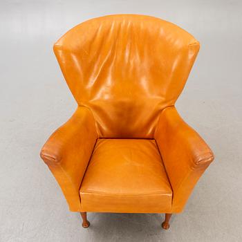 Gijs Papavoine, a Castor leather and wood armchair for Montis Netherlands later part of the 20th century.