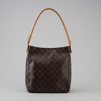 a Louis Vuitton 'Looping GM' bag.