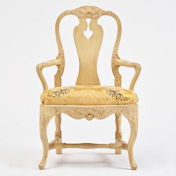 A rococo open armchair in the manner of C M Sandberg, Stockholm, later part 18th century.