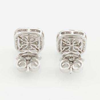 Earrings with baguette-cut and brilliant-cut diamonds.