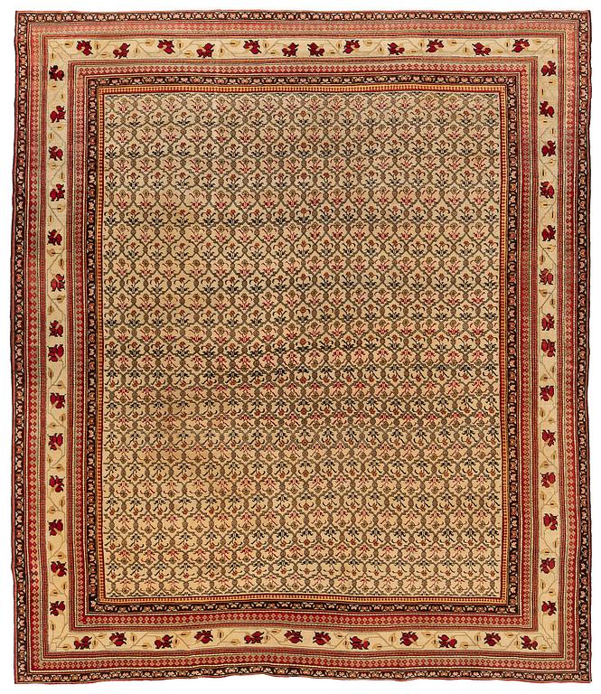 An antique Agra carpet Of Mughal 'Shrub' design, Northern India, c. 335 x 287 cm.