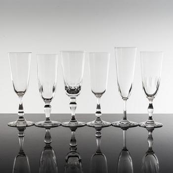 18 glass champagne flutes, ca 1900.