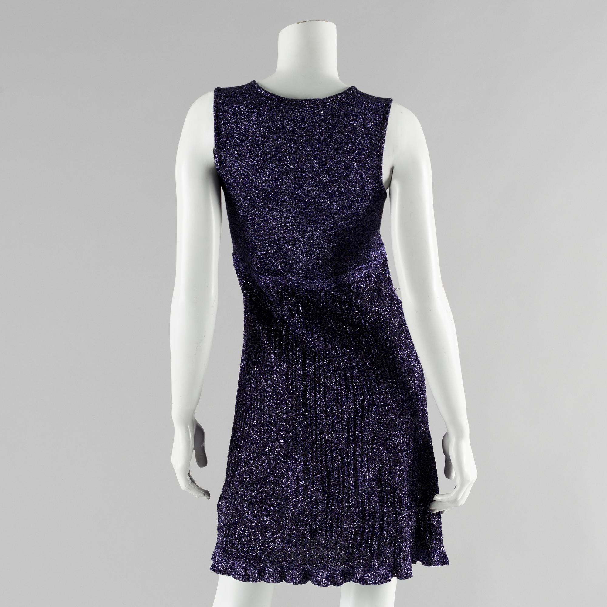 A dress and cardigan by Valentino RED.