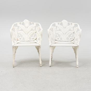 A pair of painted aluminum armchairs, second part of the 20th Century.