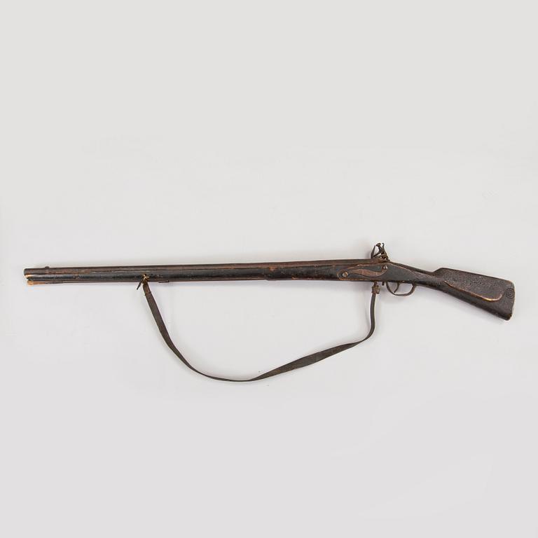 An early 19th century flintlock rifle.