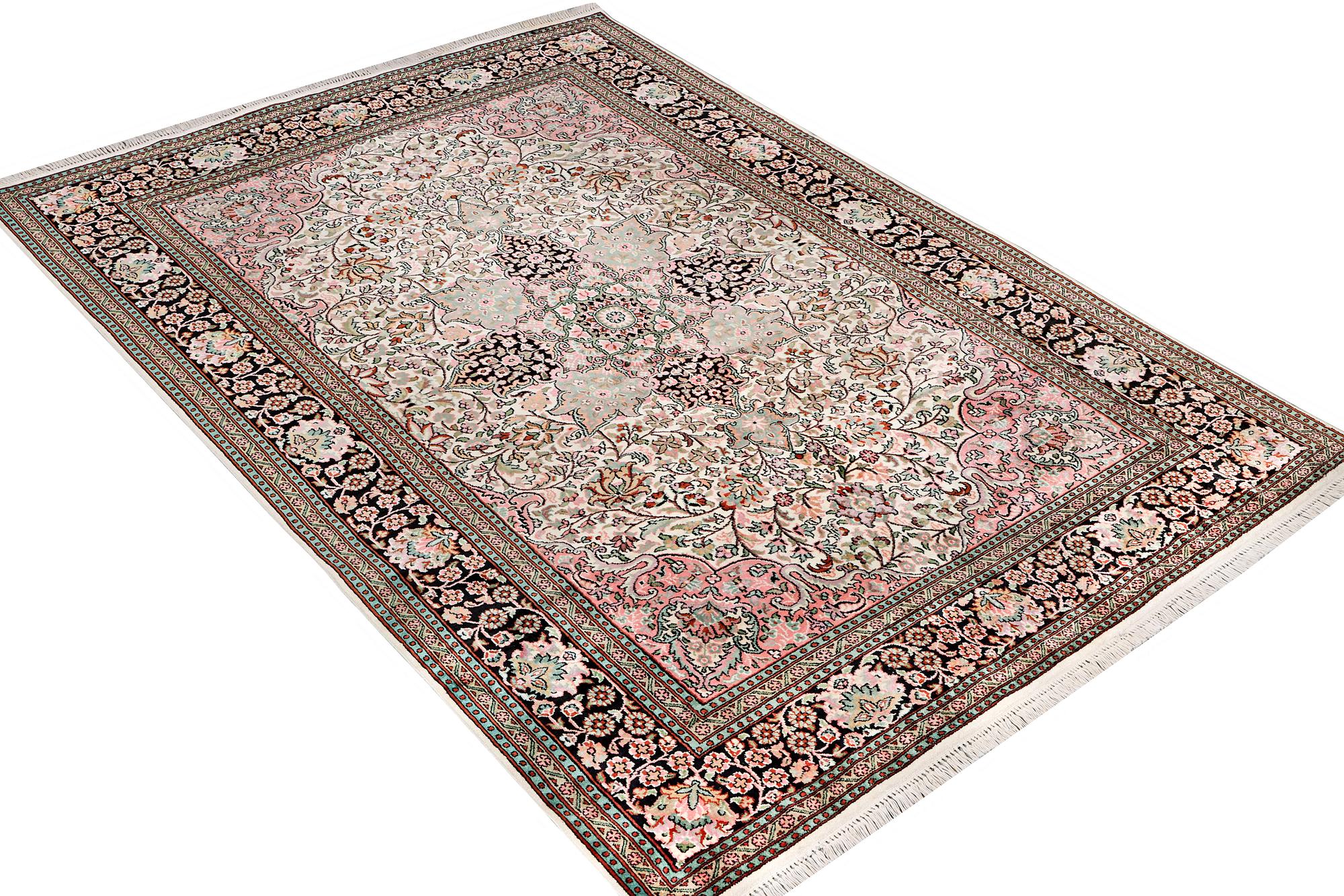 A silk Kashmir carpet, c. 267 x 185 cm.