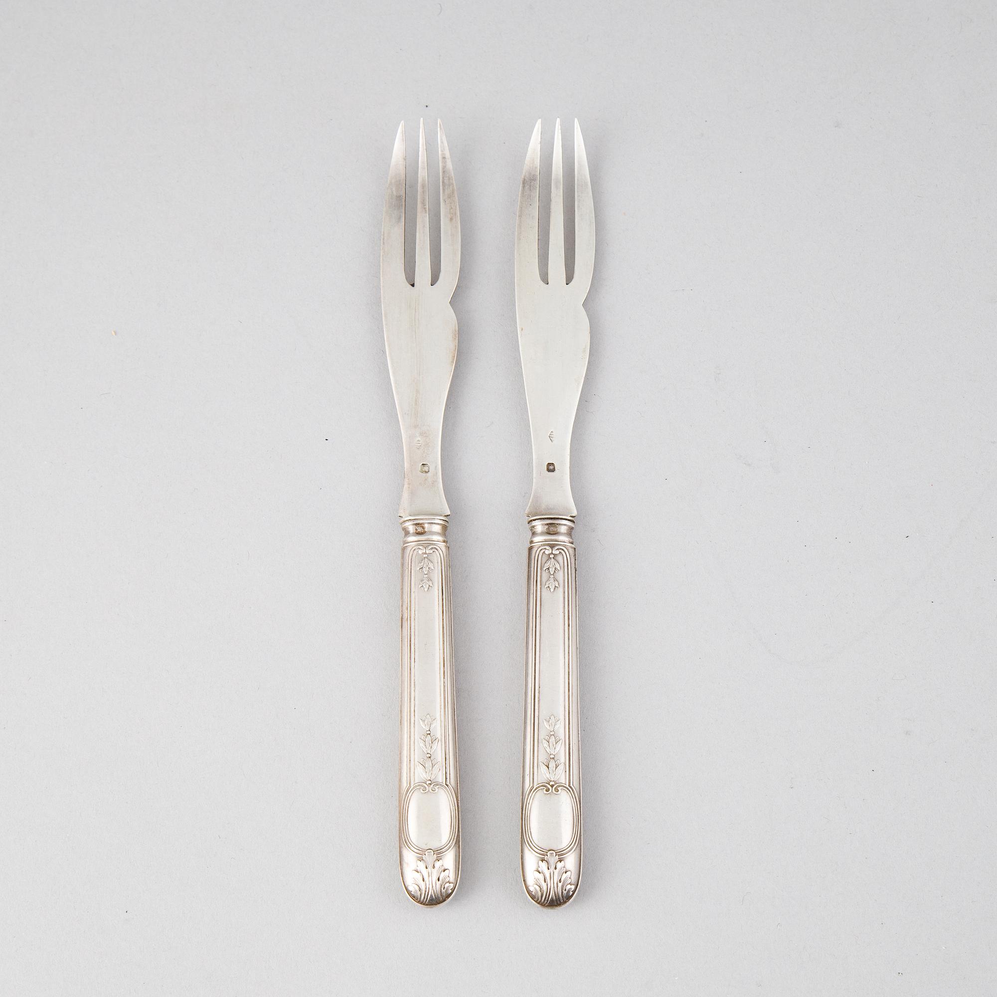 A set of twelve French 19th century silver lobster forks.
