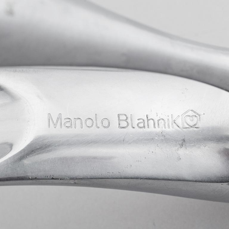 A metal shoe horn by Manolo Blahnik, 2000s.