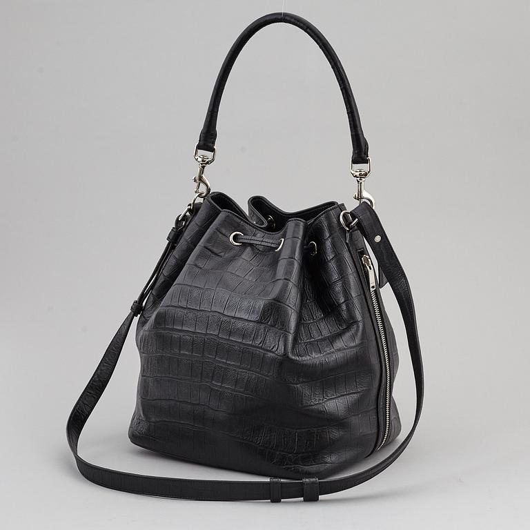 YVES SAINT LAURENT, a black leather 'Emmanuelle' bag.