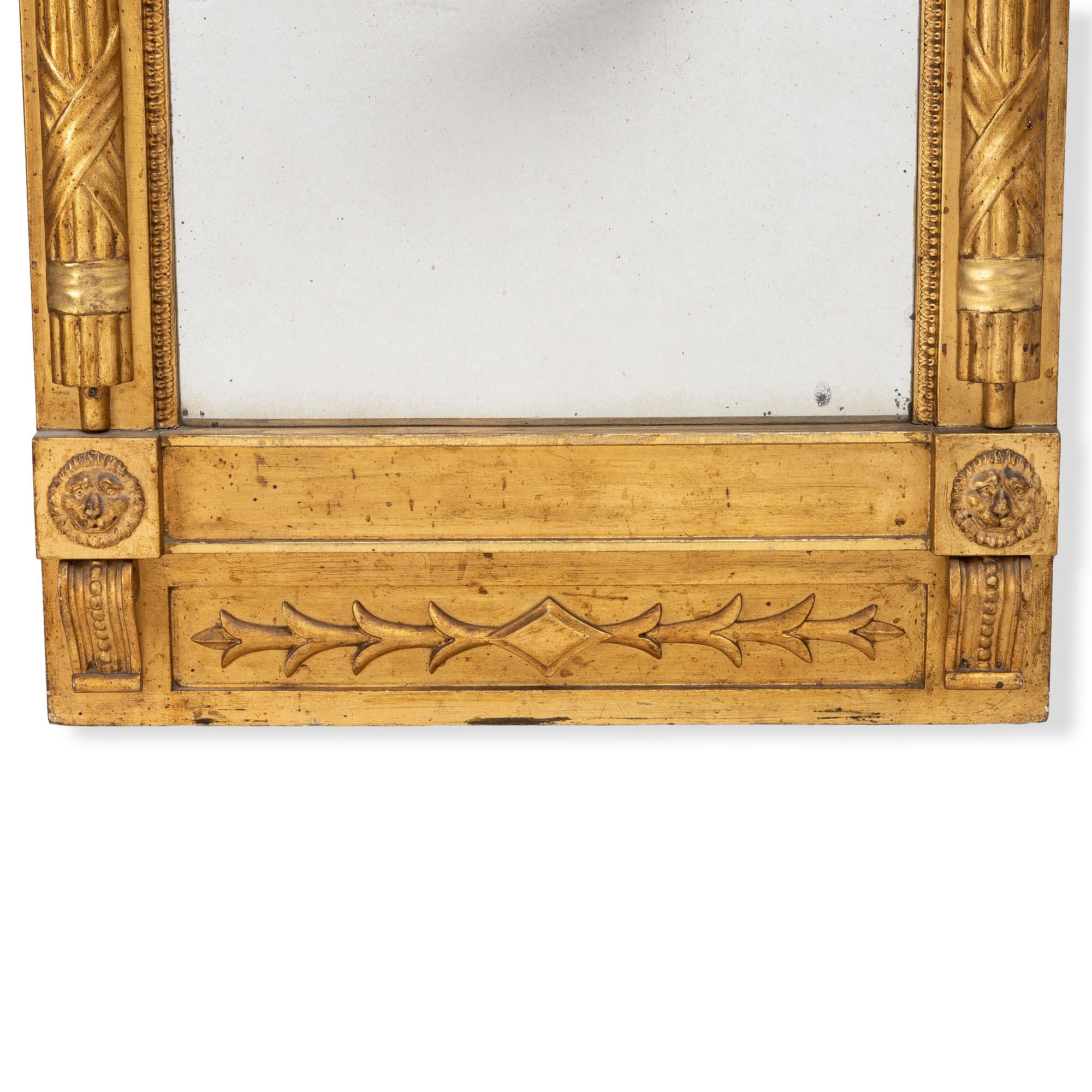 An Empire giltwood mirror by C. G. Hafström (master in Stockholm 1795-1815).