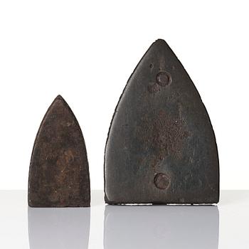 Two cast iron clothes irons, 18th / early 19th century.