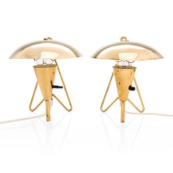 Two mid-20th-century wall lights / table lamps, model EV 57 for Itsu, Finland.