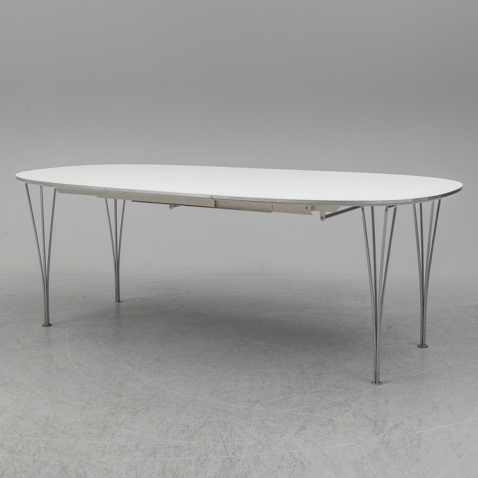PIET HEIN & BRUNO MATHSSON, a 'Superellips' dining table, Fritz Hansen, Denmark.