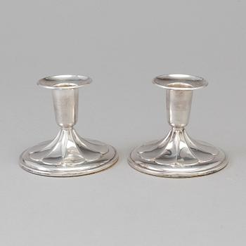 CESON, a pair of silver candlesticks from Gothenburg, 1987.