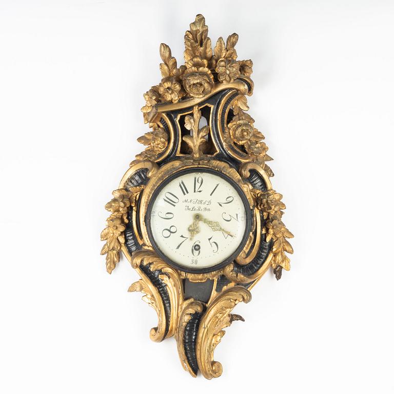 A Rococo wall clock, second half of the 18th Century.