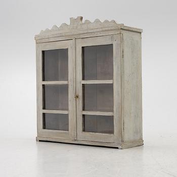 A wall cabinet, 19th Century.