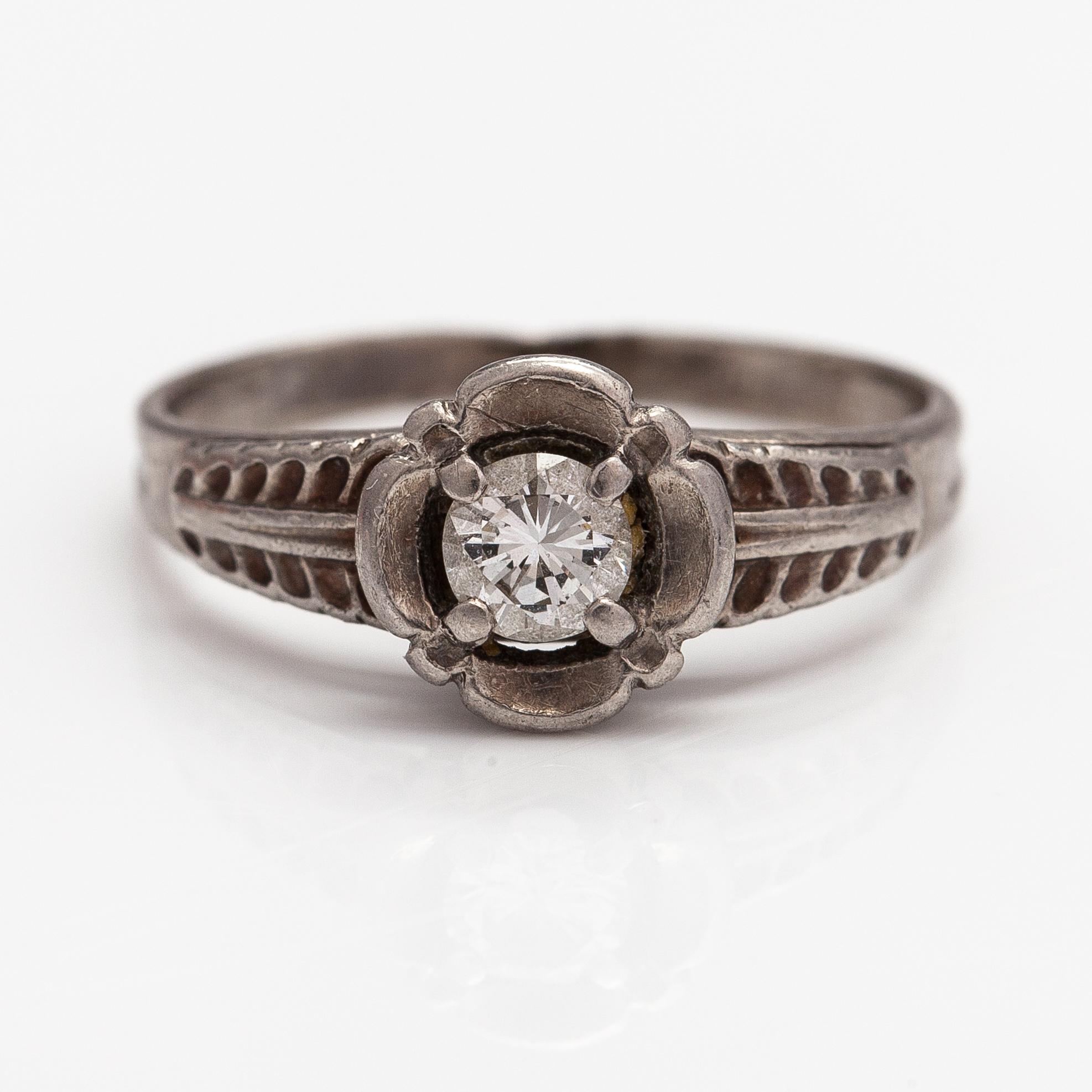 A Tillander, a palladium ring with a ca. 0.23 ct diamond. Helsinki.