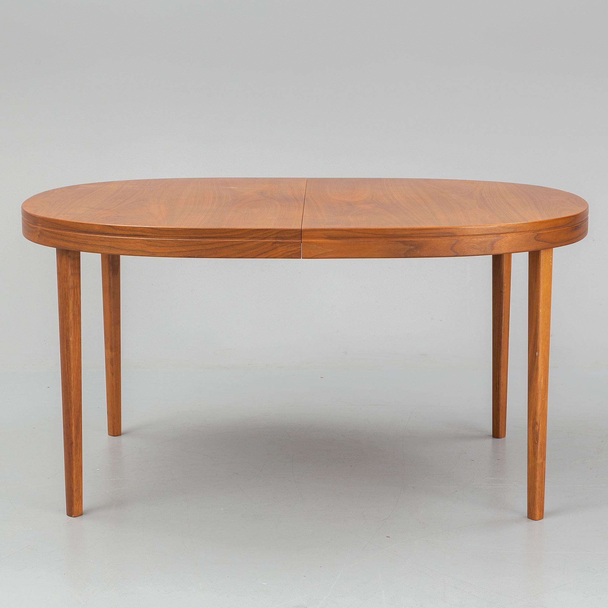 A walnut veneer table from the second half of the 20th century.