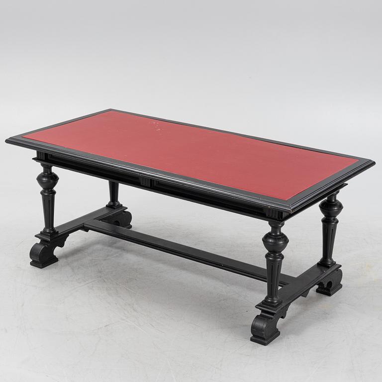 A renaissance style library table, around 1900.