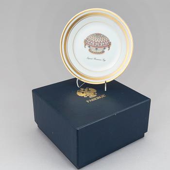 Four porcelain small dishes "Fabergé" from Limoges France.