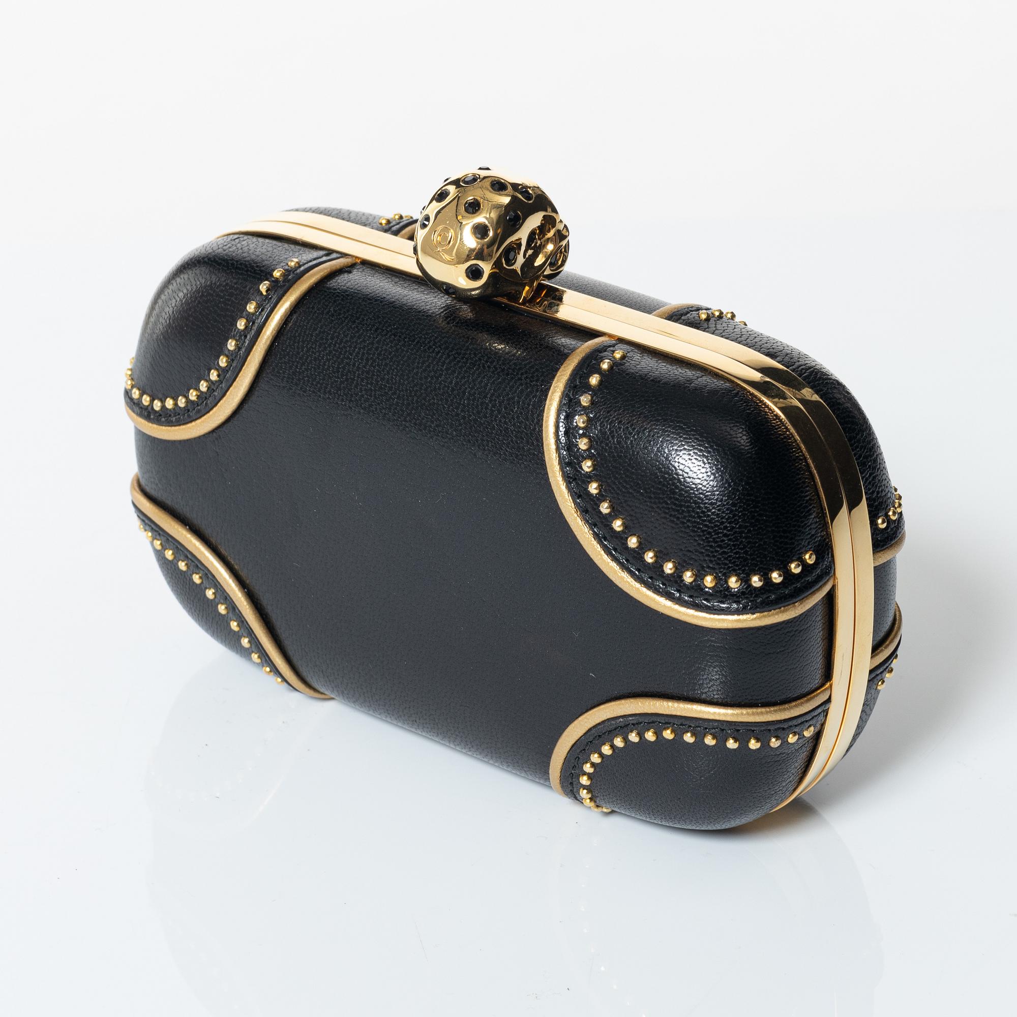 Alexander McQueen, clutch.