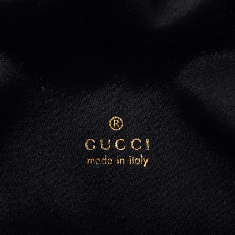 Gucci, a beaded handbag.