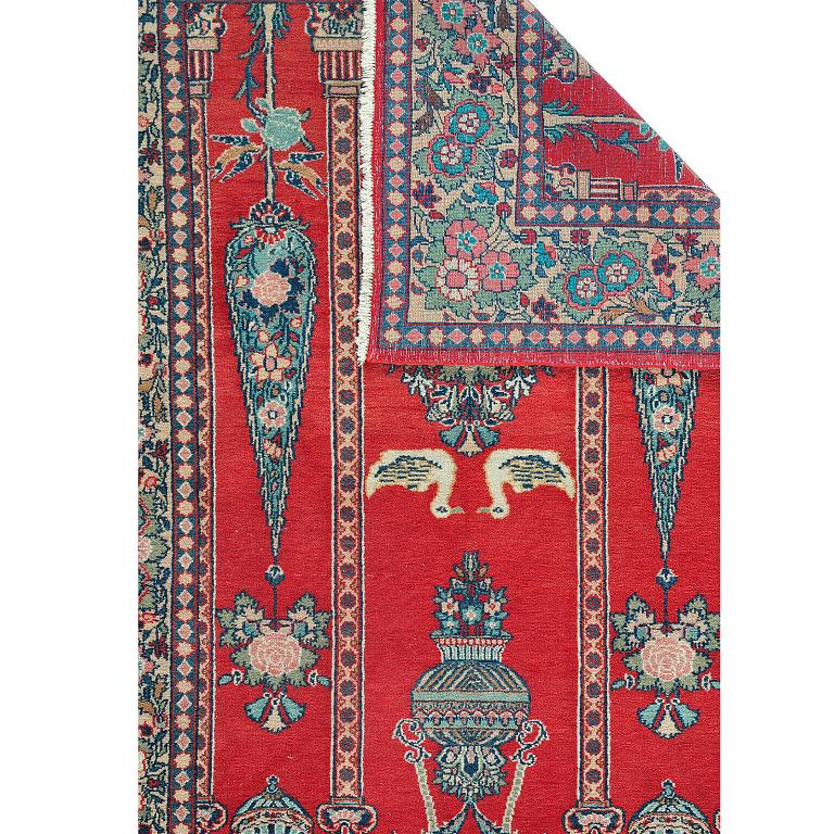 A rug, semi-antique Kashan/Sarouk, ca 210 x 132 cm. figural.