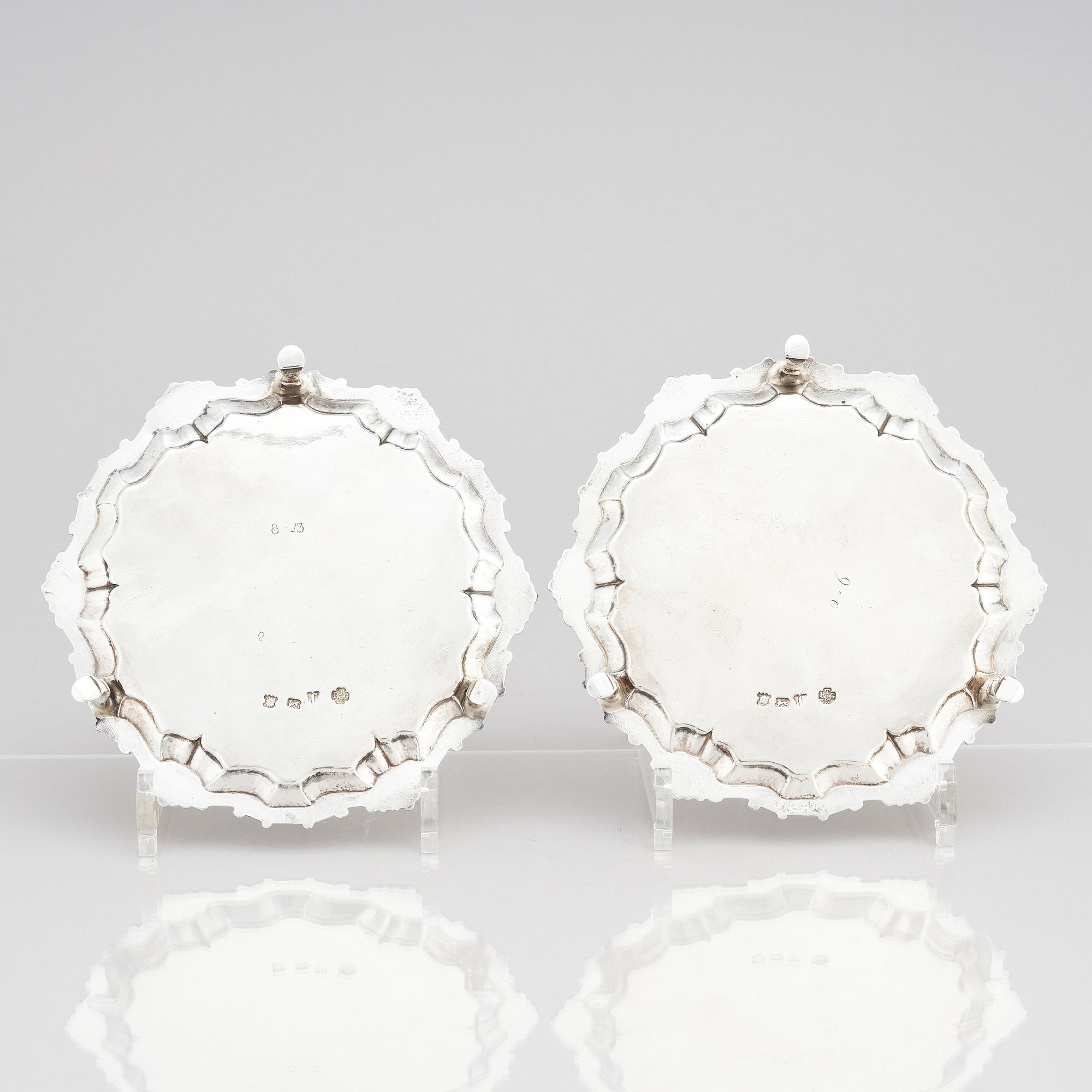 A pair of English silver salvers/plates, marks of Thomas Cooke II and Richard Gurney, London 1753.