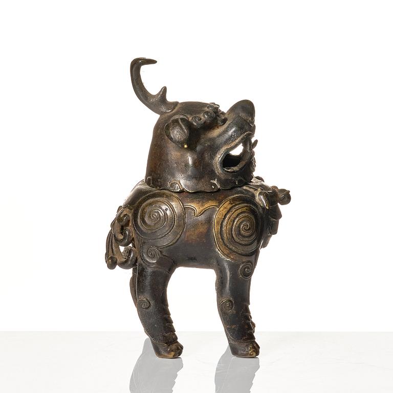 A bronze censer in the shape of a buddhist lion, Ming dynasty (1368-1644).