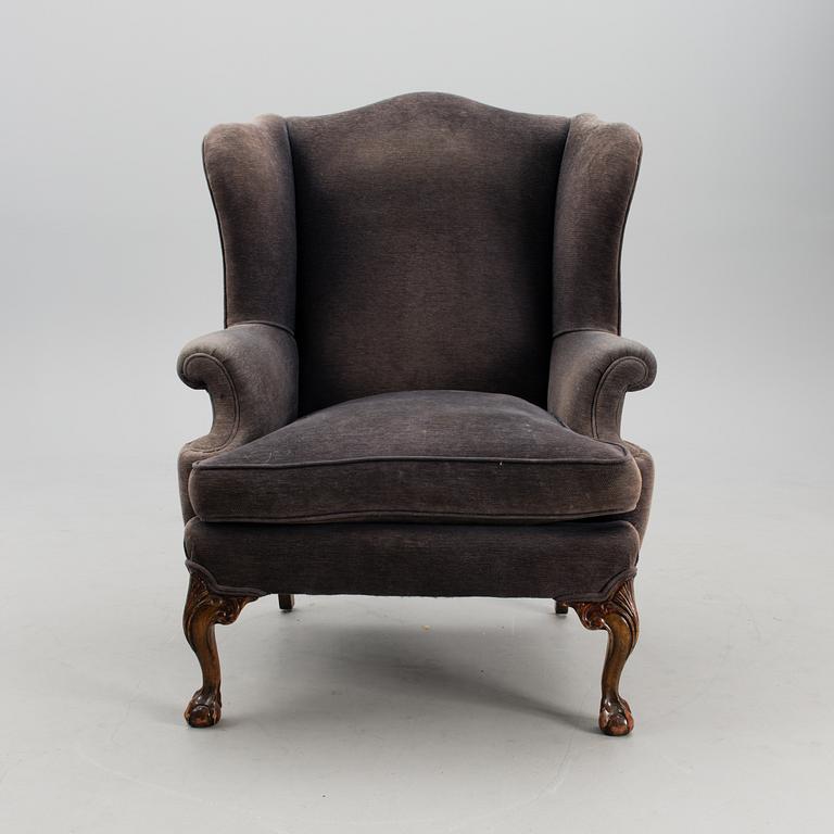 A late 20th century wing chair.