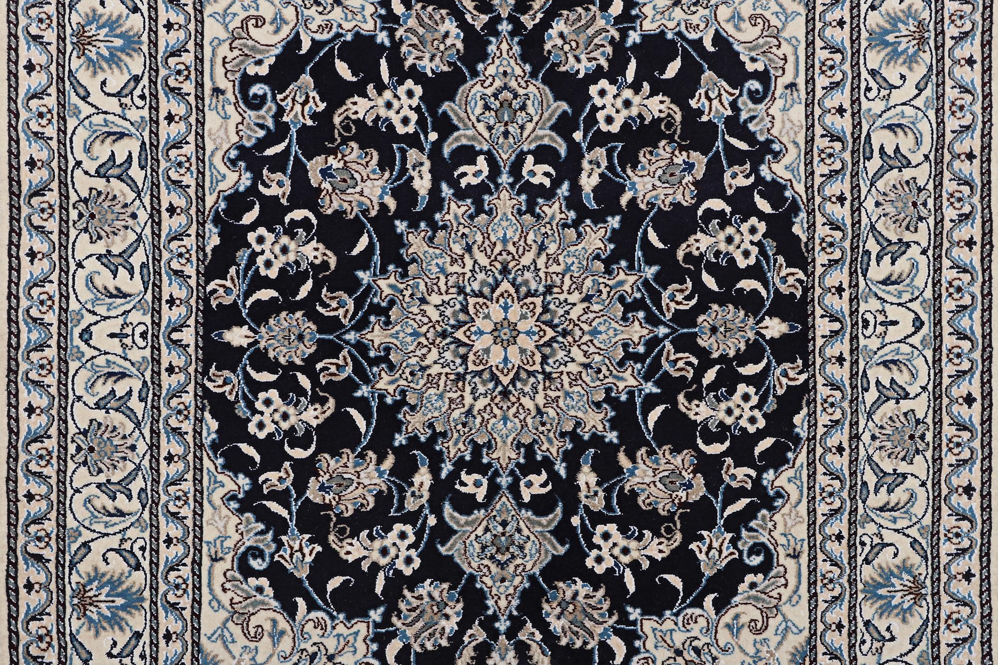 A rug, Nain, part silk, ca 198 x 144 cm.