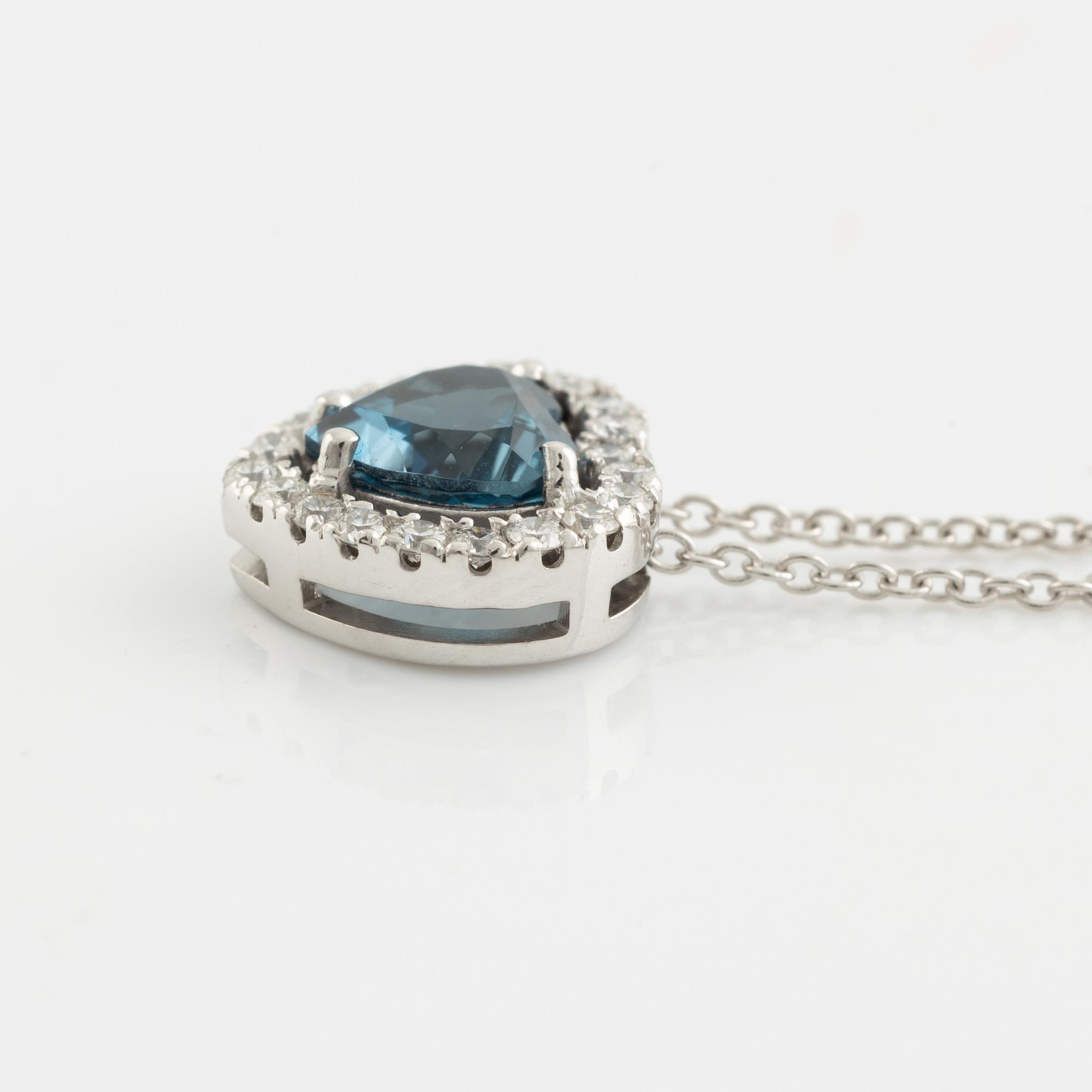 Collier med hjärtformad blå topas och briljantslipade diamanter.