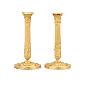 A pair of Empire candlesticks.