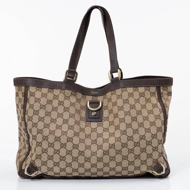 Gucci, a canvas and leather bag.