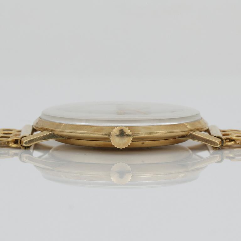 ARMBANDSUR, Precimax, med boett i 14K guld samt armband i 18K guld, stampläd Stockholm, 1963. Total vikt ca 47,4 g.