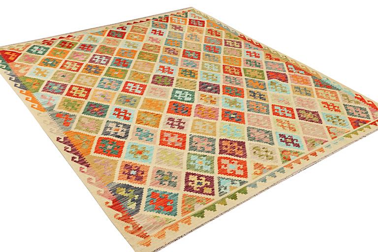 A Kilim carpet, c. 296 x 253 cm.