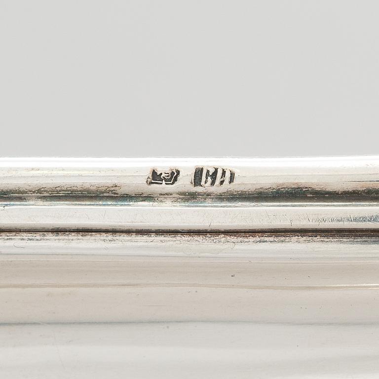 A Russian silver tray, Moscow, maker's mark IV. Unclear year mark, assay master mark Aleksandr Kudrin (1878-82).