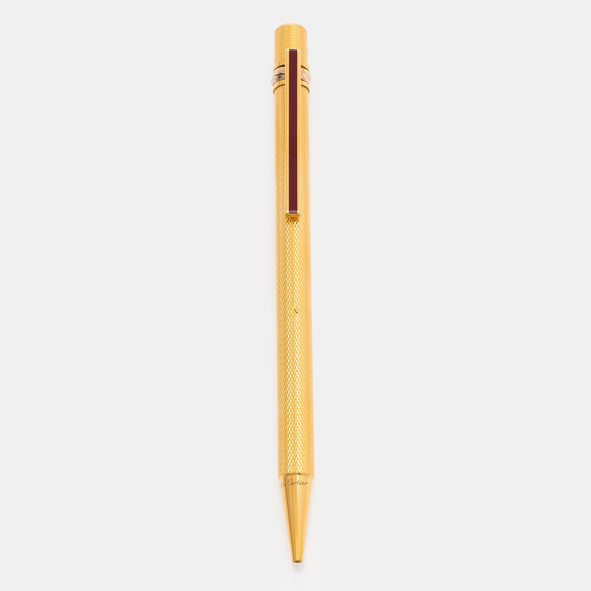 Cartier, must de Cartier, a "Trinity" ballpoint pen.