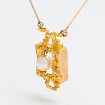 Björn Weckström, Halsband "Magisk pärla", 14K guld och odlad pärla. Pekka Anttila Kruunu-Koru/Lapponia 1965.