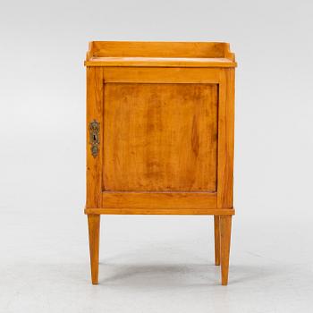 A Gustavian style bedside table, around the year 1900.