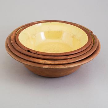 Four partially glazed eartheware bowls, Gefle, 19th Century.