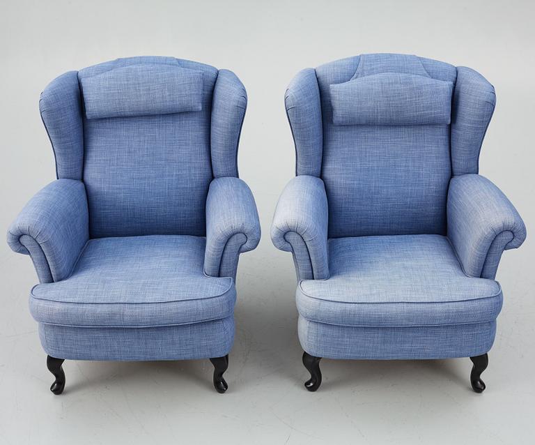 Fåtöljer ett par, med fotpallar, Bröderna Andersson.